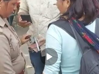 The girl was roaming in the market with a gun