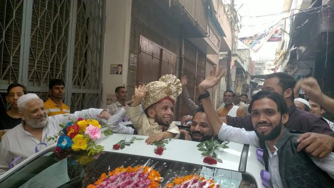 Two and a half feet groom got brides