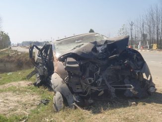 Speeding car collided with divider