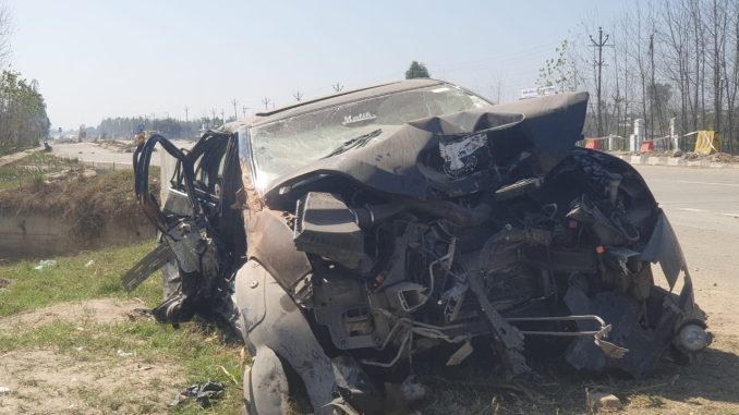 Speeding car collided with divider